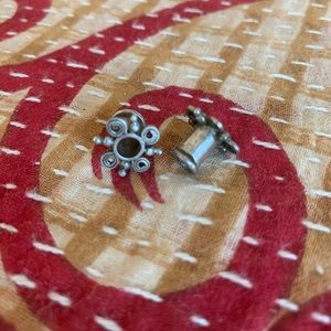 Silver tribal ear plugs